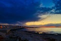 Beautiful sunset in western part of island of Crete, near town of Hersonissos. beach resort Seascape. Sunset over the Royalty Free Stock Photo