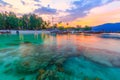 Beautiful sunset on white sand beach and Clear water to see the coral reef at Koh Lipe island in Satun,Thailand Royalty Free Stock Photo