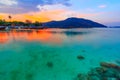 Beautiful sunset on white sand beach and Clear water to see the coral reef at Koh Lipe island in Satun,Thailand Royalty Free Stock Photo