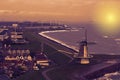 Beautiful sunset at the windmill of Vlissingen, city skyline of a popular town in the evening, Zeeland, The Netherlands Royalty Free Stock Photo