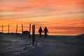 Beautiful sunset in winter, snow. People Royalty Free Stock Photo