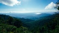 Beautiful sunshine at misty morning mountains of Thailand. Rainforest ecosystem and healthy environment concept background, Royalty Free Stock Photo