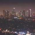 Beautiful super wide-angle night aerial view of Los Angeles, California, USA, with downtown district, mountains and scenery beyond Royalty Free Stock Photo