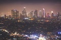 Beautiful super wide-angle night aerial view of Los Angeles, California, USA, with downtown district, mountains and scenery beyond Royalty Free Stock Photo