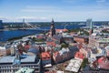 Beautiful super wide-angle panoramic aerial view of Riga, Latvia with harbor and skyline with scenery beyond the city Royalty Free Stock Photo