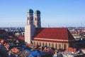 Beautiful super wide-angle sunny aerial view of Munich, Bayern, Bavaria, Germany with skyline and scenery beyond the city, seen fr Royalty Free Stock Photo