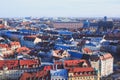 Beautiful super wide-angle sunny aerial view of Munich, Bayern, Bavaria, Germany with skyline and scenery beyond the city, seen fr