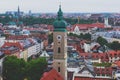 Beautiful super wide-angle sunny aerial view of Munich, Bayern, Bavaria, Germany with skyline and scenery beyond the city, seen fr Royalty Free Stock Photo