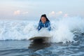 Beautiful Surfer Girl. Surfing Woman On Surfboard In Ocean. Smiling Brunette Swimming In Splashing Sea.