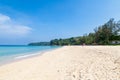 Beautiful Surin beach in Choeng Thale city, Phuket, Thailand with white sand, turquoise water and palm trees