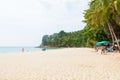 Beautiful Surin beach in Choeng Thale city, Phuket, Thailand with white sand, turquoise water and palm trees