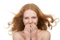 Beautiful surprised woman with flowing hair Royalty Free Stock Photo