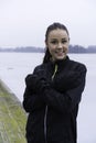 Beautiful Swedish caucasian fitness teen girl standing on wood bridge outdoor in winter landscape Royalty Free Stock Photo