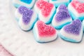 Beautiful sweet hearts, blue, red and white colorful marmalade candies