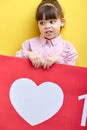beautiful sweet kid girl holding big red sign like, posing, little blogger