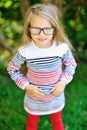 Beautiful sweet little girl in glasses