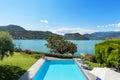 Beautiful swimming pool overlooking the lake Royalty Free Stock Photo