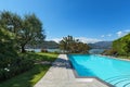 Beautiful swimming pool overlooking the lake Royalty Free Stock Photo