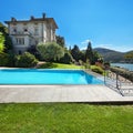 Beautiful swimming pool overlooking the lake Royalty Free Stock Photo