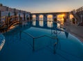 Beautiful swimming pool with thermal watere on the sunset Royalty Free Stock Photo