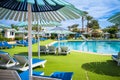 Beautiful swimming pool in tropical resort with palms. Swimming pool blue sky with clouds. Africa Egypt Royalty Free Stock Photo