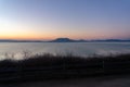 beautiful szaplonczay promenade with lake balaton landscape in Fonyod Hungary with badacsony hill background Royalty Free Stock Photo