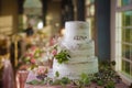 a beautiful table adorned with plants on a wedding