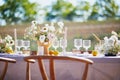 Beautiful table set with candles and flowers for a festive event, party or wedding reception Royalty Free Stock Photo