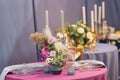 Beautiful table set with flowers and candles Royalty Free Stock Photo