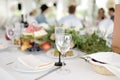 Beautiful table set for a party, wedding reception or festive event. Fruits and appetizers for event dinner. Stylish flowers Royalty Free Stock Photo