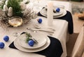 Beautiful table setting for Christmas dinner Royalty Free Stock Photo