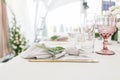 Beautiful table setting with crockery and flowers for a party, wedding reception or other festive event. Glassware and Royalty Free Stock Photo