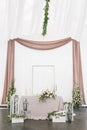 Beautiful table setting with crockery and flowers for a party, wedding reception or other festive event. Glassware and Royalty Free Stock Photo