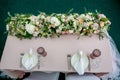 Beautiful table setting with crockery and long flowers forarrangement a party, wedding reception or other festive event. Glassware Royalty Free Stock Photo