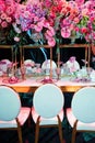 Beautiful table setting with flowers decorations and tableware