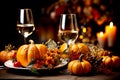Beautiful table setting with pumpkins, leaves and flowers in dining room for fall holidays halloween or Thanksgiving Royalty Free Stock Photo