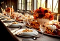 Beautiful table setting with pumpkins, leaves and flowers in dining room for fall holidays or Thanksgiving Royalty Free Stock Photo