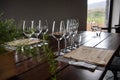 Beautiful table setting in a restaurant with empthy wine glasses.