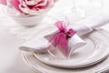 Beautiful table setting with small present