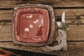 Beautiful table setting, square plates of different sizes lie on top of each other, minimalism, boho style