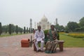 Senior citizen couple in front of beautiful Taj mahal of India,Agra 5th July ,2016