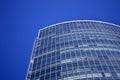 Beautiful tall glass building against the blue sky Royalty Free Stock Photo