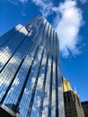 Tall skyscraper with reflection of sky in Chicago