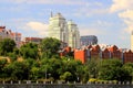 Beautiful tall white towers, skyscrapers, red buildings, park against the sky in summer and spring. Best view of Dnipro