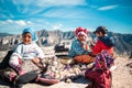 Beautiful Tarahumara kids with mountains and the sunny blue sky in the background in Mexico