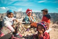 Beautiful Tarahumara kids with mountains and the sunny blue sky in the background in Mexico
