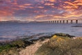 Beautiful Tay Railway Bridge, in Dundee at the end of the day at sunset with reflections from the sky on the Tay Royalty Free Stock Photo