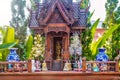 A beautiful teak Thai spirit house.