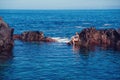 Beautiful girl resting in natural ocean swimming pool