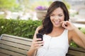 Beautiful Teen Female Texting on Cell Phone Outdoors Royalty Free Stock Photo